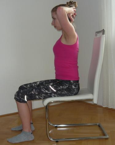 8. Cvik: Uvolnění krční páteře a protažení šíjových svalů VP: Sed na židli (nebo turecký sed), DKK mírně od sebe, kolena na šířku pánve, pánev ve středním postavení, zpevněné břišní svalstvo, HKK