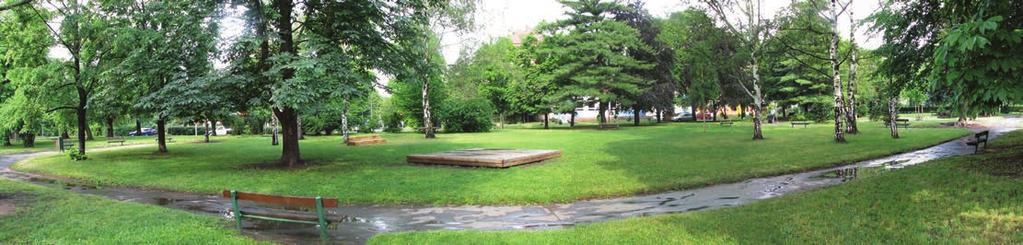 Celek je zhruba v polovině rozdělen zeleným pásem parkového náměstí, které je orientováno kolmo k ulici