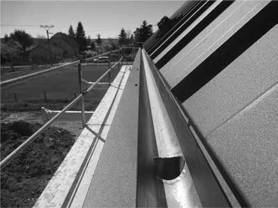Main risks of the solution - If a gutter damage and leakage occurs, it cannot be visually recognizable on the facade. Picture 6.: Actual photo - exterior (Source:M.