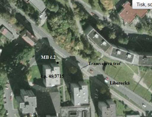 Bod je umístěn 3,5 m nad povrchem komunikace Liberecká. Na následující situaci a obrázcích je bod MB č. 2 znázorněn. Situace: Komunikace Liberecká je obousměrná, má v každém směru jeden pruh.