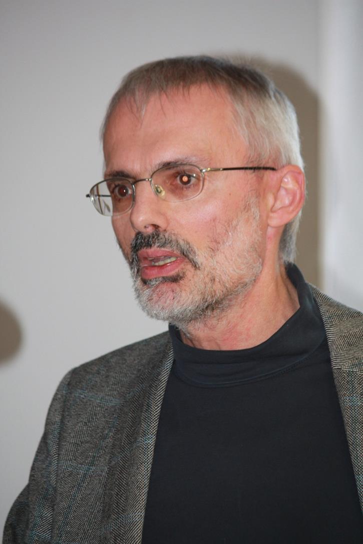 Prof.