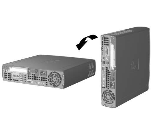 4. Položte počítač na bok tak, aby spočíval na gumových podložkách. P eklopení počítače do polohy Desktop 5.