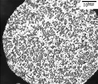 Obr.7: Mikrostruktura nežíhané práškové Al-2Fe-6Cr-1,5Ti-1Si slitiny, velikost částic (63-100) µm, Obr.