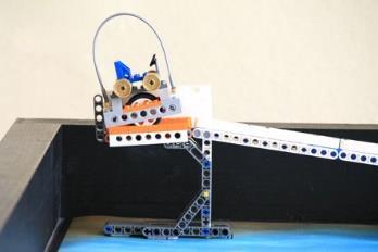 přepravník s nákladem přepravníky s posádkou přepravník vozidla Úkol Robot musí vyslat přepravníkové rakety (vozíky) tak, aby sjely z odpalové rampy.