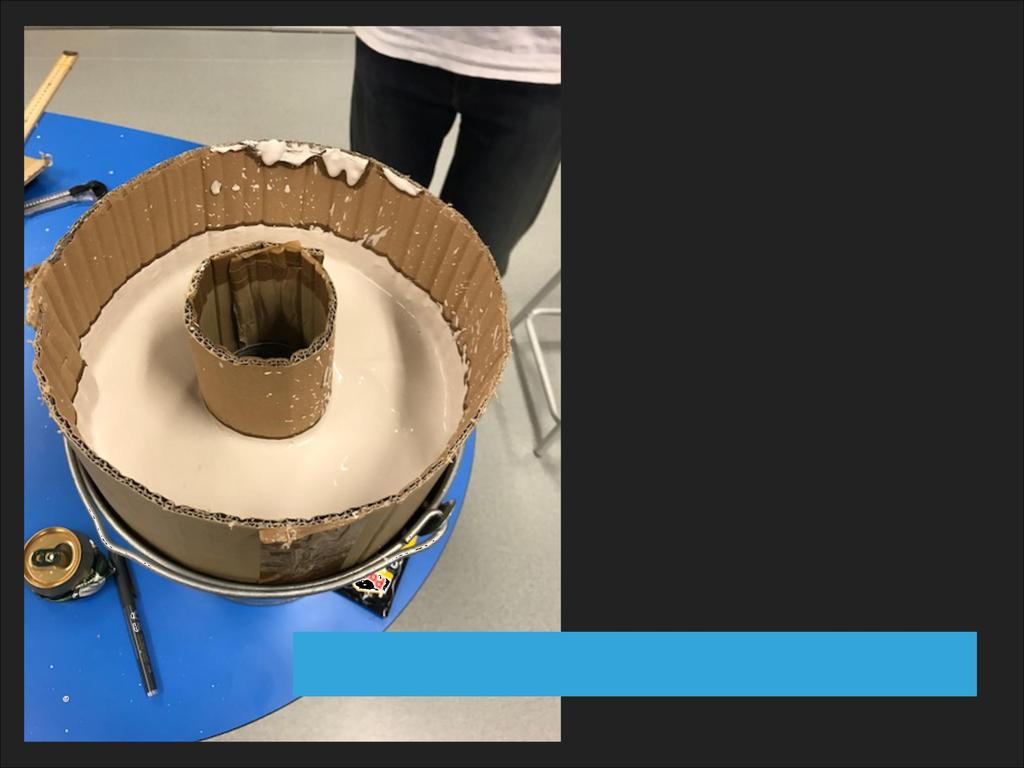 WE THEN USED CARDBOARD TO ALIGN THE BOTTOM AND REST OF THE