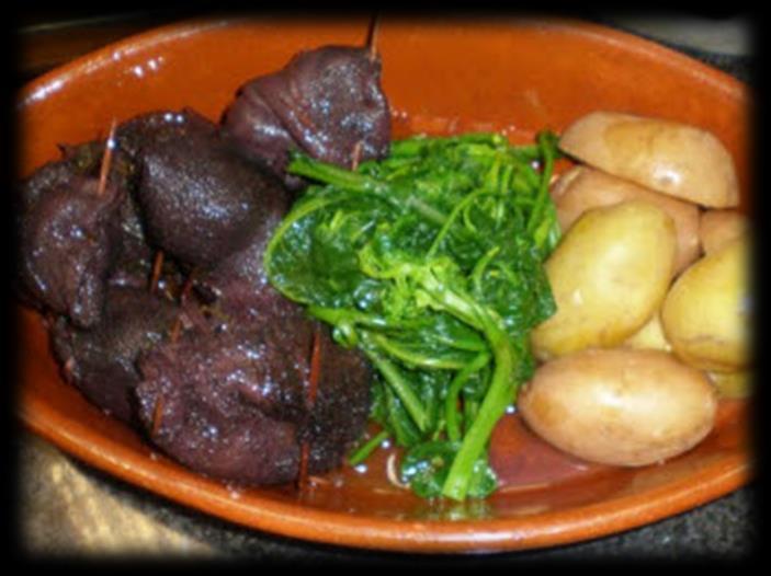 Negalhos 2 Sheep Stomachs 250g of lard 1 Onion 2 Laurel Leafs 2 Cloves of India 2 Spoons with Olive Oil 5 dl of Red Wine 5 dl of Water 2 Cloves 1 Mint Leaf Salt (as much as you like) Pepper (as much