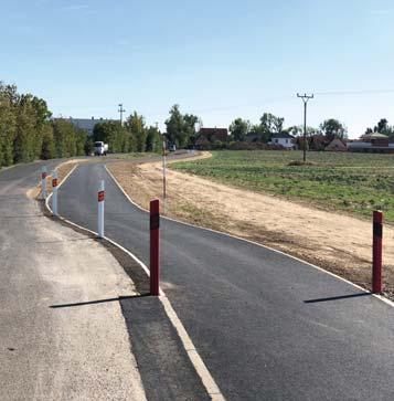 350 m dlouhé asfaltové cyklostezce do ulice Ke Skále a dále po cyklostezce mezi Vestcem a