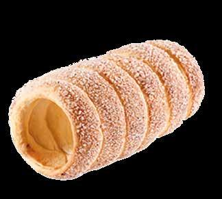 Trdelník Ladislav Langer 500 g polohrubé mouky 120 g tuku nebo sádla s máslem 200 g ořechů, 40 g droždí, 2 lžíce cukru, 4 žloutky, 1 vejce na potření, mléko, sůl, máslo
