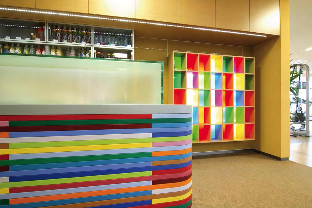 Reception desk cladding made of coloured plastic stripes Detail of