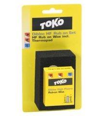 58: stlačená kostka firmy TOKO ( TOKO, 2010 ) Dibloc HF Paste Wax se dá, díky aplikátoru, jednoduše použít na