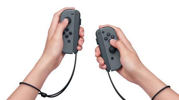 Používání příslušenství Joy-Con grip Levý a pravý Joy-Con můžete také připojit k příslušenství Joy-Con grip a používat je jako jeden ovladač.