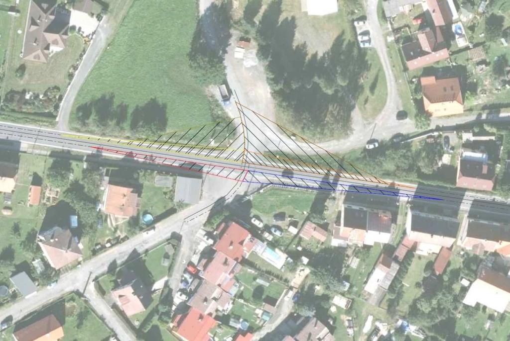 Křižovatka s místní komunikací vedoucí ke sportovnímu areálu a s místní komunikací vedoucí k domu č. p. 310. Křižovatka č.
