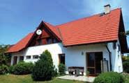 jednotkami, pozemek 972 m 2, dvojgaráž, dům je vhodný pro vícegenerační bydlení či