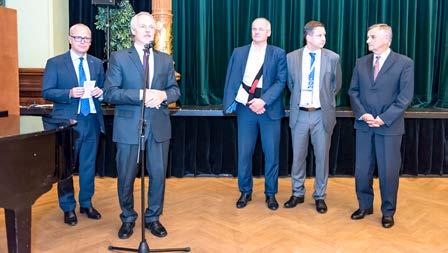 Prof. Ladislav Jarolím, MD, CSc., both from the Department of Urology of the Second Faculty of Medicine, Charles University, and Motol University Hospital. To the right of them sits Assoc. Prof.