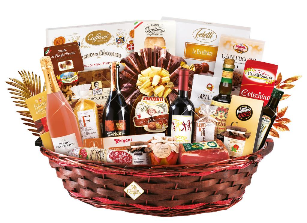 KOD 560100 Amedeo Oválný proutěný koš hnědé barvy ručně vyplétaný s dřevěnými úchyty 1 x klasická Panettone ručně balená 1000g 1 x tabulka extra hořké čokolády 75 g 1 xkrabička jemných čokoládiček