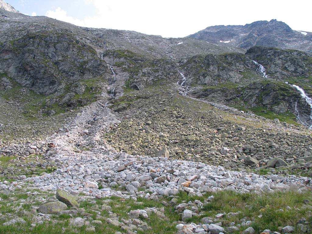 16) FLOW OF SILTY SOILS AND DEBRIS DUE TO THE