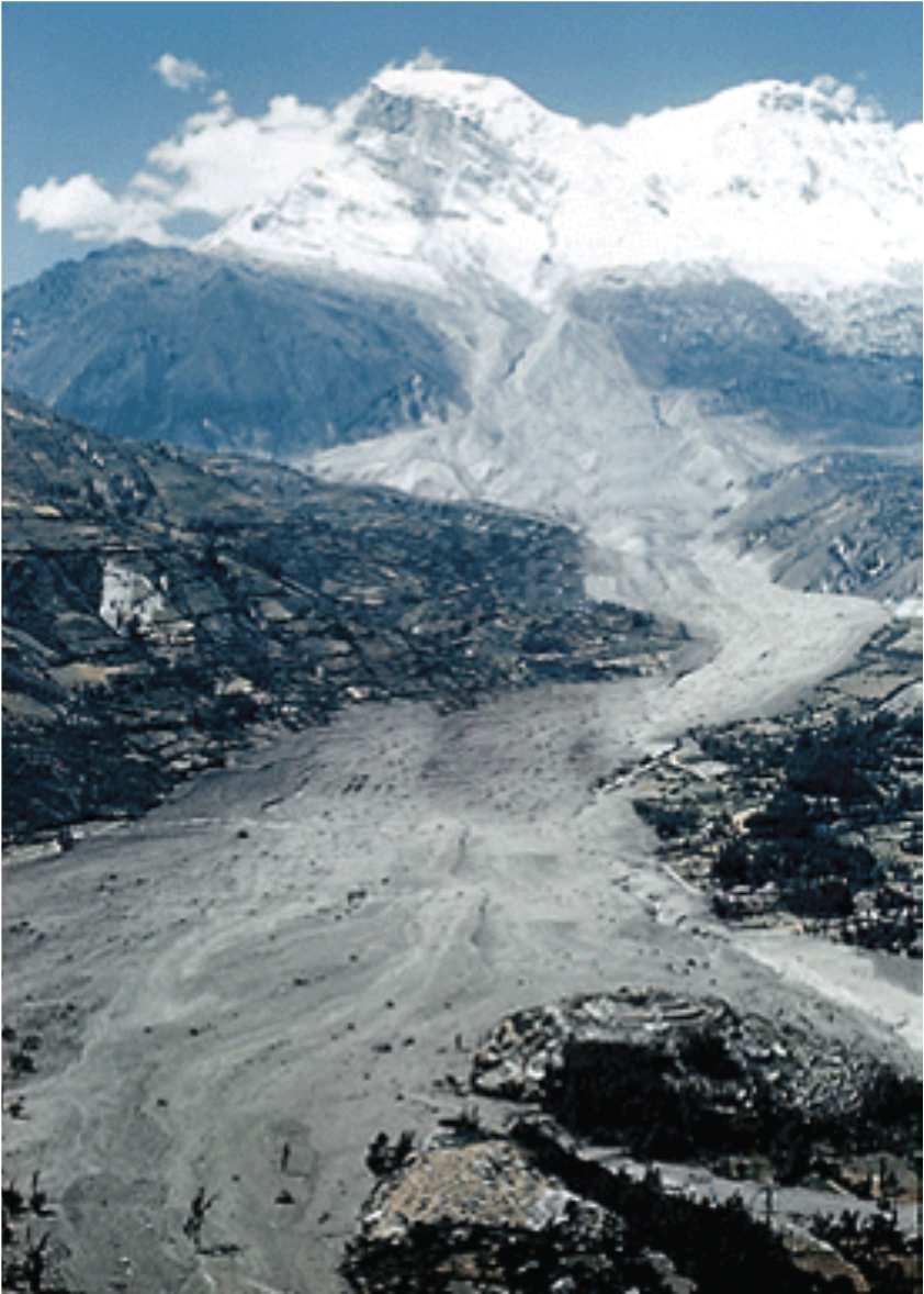 16) FLOW OF SILTY SOILS AND DEBRIS DUE TO THE IMPACT OF HEAVY RAINFALL This is a photograph showing the aftereffects of a multi-hazard event.