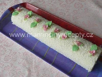 Kokosová roláda s medem těsto: 5 vajec, 150 g cukru krupice, 100 g polohrubé mouky, 1 lžíce oleje krém: 250 g másla, 5 lžic tekutého medu, 2 lžíce rumu, 100 g strouhaného kokosu dále: kokos na