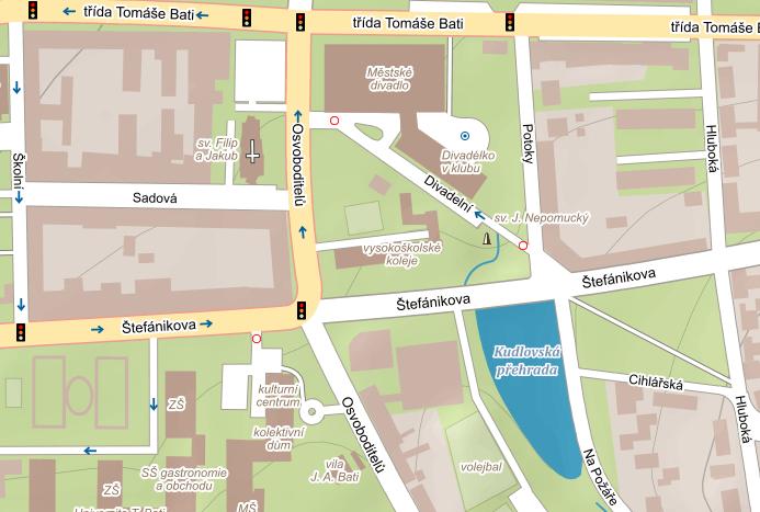 UTB ve Zlíně, Fakulta multimediálních komunikací 14 ulicí Na Požáře a park předělaný z původního hřbitova, na západním břehu se nachází budova Centroprojektu.