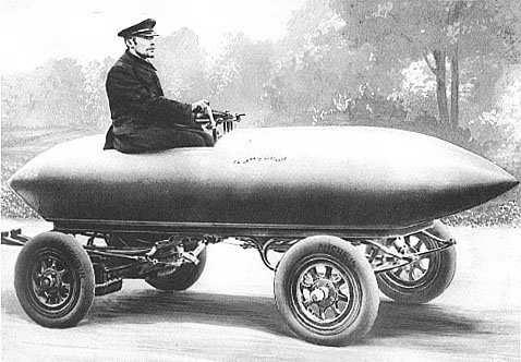 V roce 1899 překonalo toto vozidlo jako první v té době "magickou" rychlost 100 km/hod. Obr. 1. Vozidlo torpédového typu La Jamais Contente [5] Za první aerodynamický automobil lze ale považovat až vůz Tropfenwagen obr.