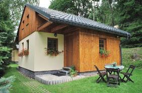 Apartmán je umístěn ve druhém patře bytového domu přímo pod sjezdovkami.