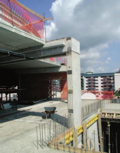 14 Prefabricated wall unit an earlier assembled support of a crossbeam is part of the monolithic transportation core Obr.