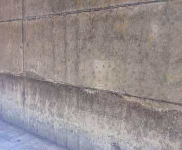 shapes and an unsuitable concrete mix: a) very complicated detail of connection of a oblique slab construction and a wall, b) edge of a strengthened