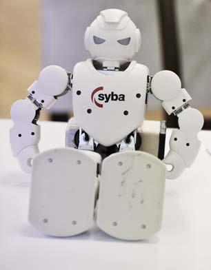 společnosti TIESSE PRAHA. Konkrétním příkladem bylo využití dvou robotů při paletizaci barev ve společnosti Primalex.