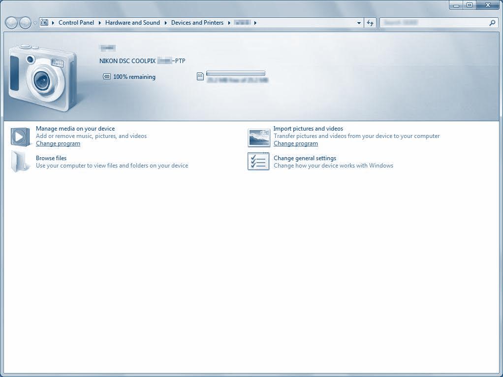 V systému Windows 7 Pokud se zobrazí dialog na obrázku vpravo, vyberte program Nikon Transfer 2 pomocí níže uvedených kroků.