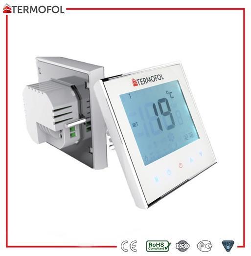 Termostat TF-H1 Charakteristika: Ovládání pomocí dotykových tlačítek Programování teploty 5 + 2 Způsob montáže: pod omítku - do instalační krabice Záruka: 24 měsíců Štíhlý tvar - tloušťka pouhých 12