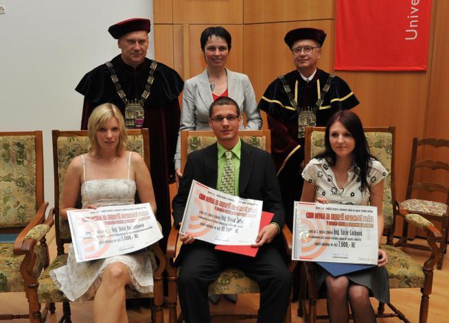 diplomovou práci a za její