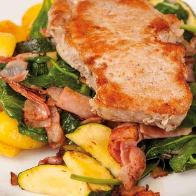 Speciality Specialty Spezialität vepřová pečeně s restovanou cuketou a špenátem na slanině, opékané brambory EN Roasted pork with sautéed zucchini and