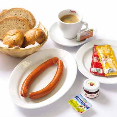 pečivo, teplý nápoj dle výběru EN EURO Breakfast - delicious sausages, mustard, ketchup, butter, jam, bread, hot drink of your choice DE EURO Frühstück - Delikatesswürstchen, Senf, Ketchup, Butter,