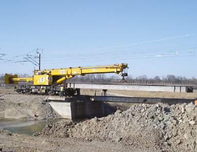 zvedací výška měřeno od horní hrany kolejnice: 16 m Výkon na metr: 9,84 t/m Počet náprav: 8 Max.