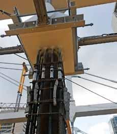 Na tyto konstrukce byly následně umístěny tzv. komory pro osazení hydraulických zdvihacích lisů a ocelových HEB sloupů, které již podpíraly přímo budoucí strop nad 2. NP a zbylou nadzemní část budovy.