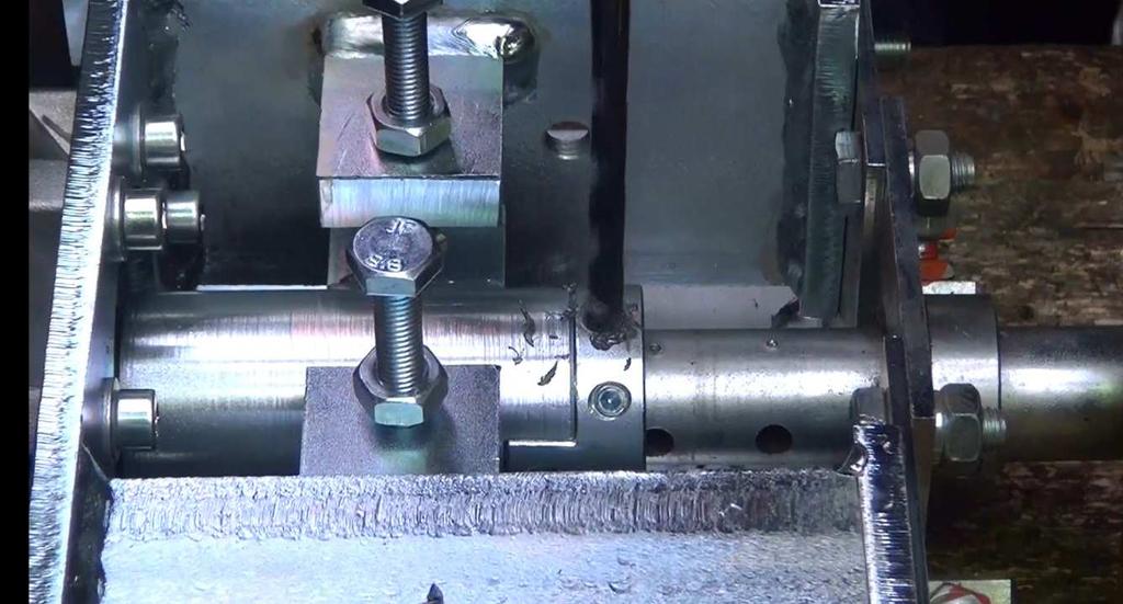 Now drill together the coupling with the disconnector shaft by a drill