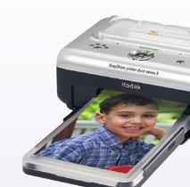 com dokovací tiskárna Kodak Printer Dock Series 3 Spolu s novými fotoaparáty letos v lednu Kodak představil také svou dokovací