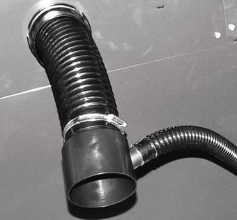 Fit the chip ejection tube of blade guard on three-way tube. 6. Then fit the main chip ejection tube to Dust collector.