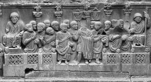 16: detail jednoho z vlysů na Constantinově oblouku v Římě; za postavami je vidět pět sloupů se sochou Jova uprostřed a čtyřmi tetrarchy po stranách; zdroj: KLEINER 2010, 296, Fig 20-10.
