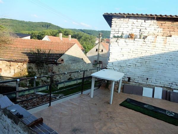 dalších místností nebo dílny.