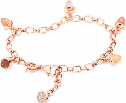 5 4 6 7 8 1. Náramek Mikado Flamenco kolekce Champagne, 18kt bílé zlato, kameny: rutilový křemen, růžový turmalín, bílý měsíční kámen, 1 přívěsek: diamanty 0,22 ct, 978 000 Kč 2.
