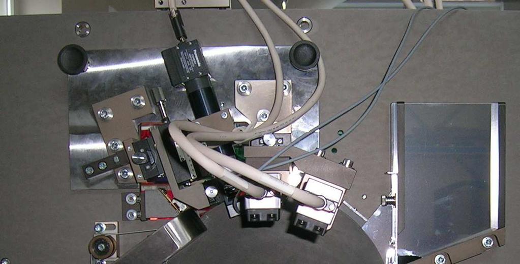 Projekt: Inšpekčný systém pre 100% kontrolu kanýl a lanciet Rok: 2009 Zariadenie kontroluje kvalitu špičky ihly (otrepy /