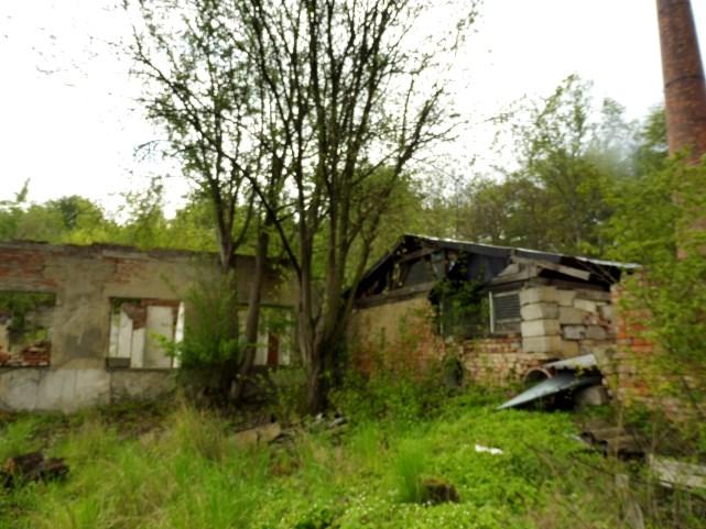 62: Poloha komínu (červený bod) vůči