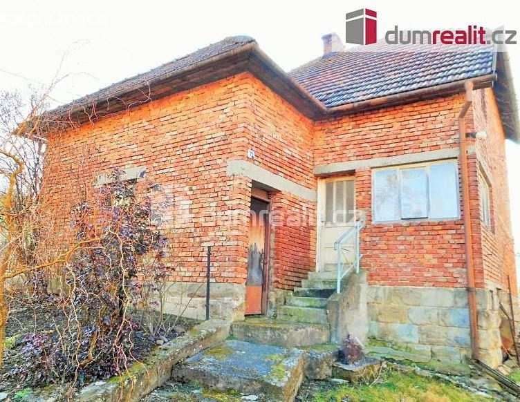2.1 Srovnávací nemovité věci (SN) rodinné domy: 1) Rodinný dům Nabídková cena: 400 000,- Kč Lokalita: Drnovice Popis: Samostatně stojící, podsklepený rodinný dům s dispozicí 3+kk.