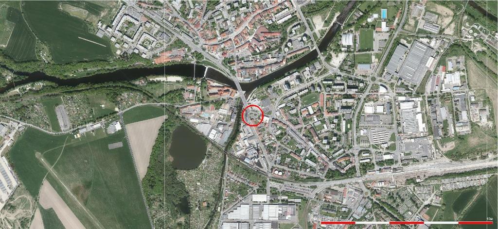 (stávající parkoviště proti kinu Oko) - Dostavba exponovaného nároží v předpolí mostu Jana