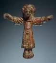 / Křížek se stylizovanou postavou ukřižovaného Krista zhotovený ze slitiny barevných kovů.
