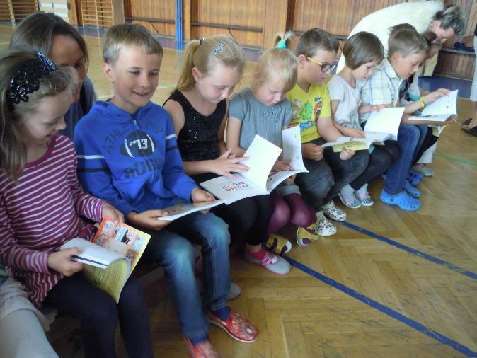 slavnostně pasováno na čtenáře. Celá akce se konala jako vyvrcholení celoročního společného projektu berounské knihovny a 2.