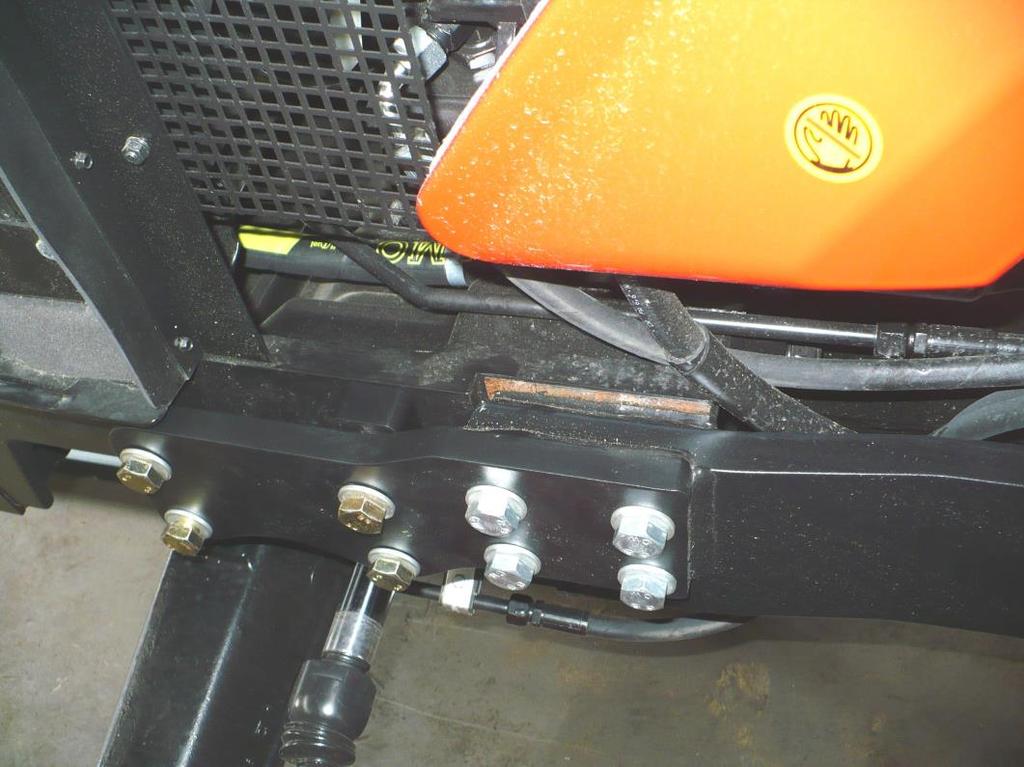 On the left side of the tractor, mount the left console pos.1 with the battery holder and with 2 pcs pos.11.