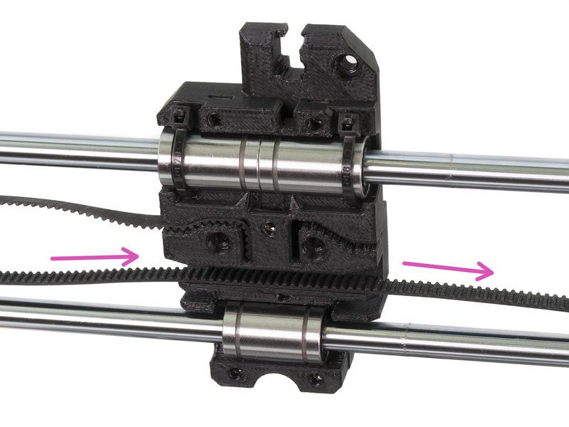 Step 7 Osa X: nasazení řemenu (2. část, nový design) Protáhněte řemen skrz tištěný díl X-end-idler, okolo kladky 623h a zpět. Pokračujte protažením řemenu skrze X-carriage.