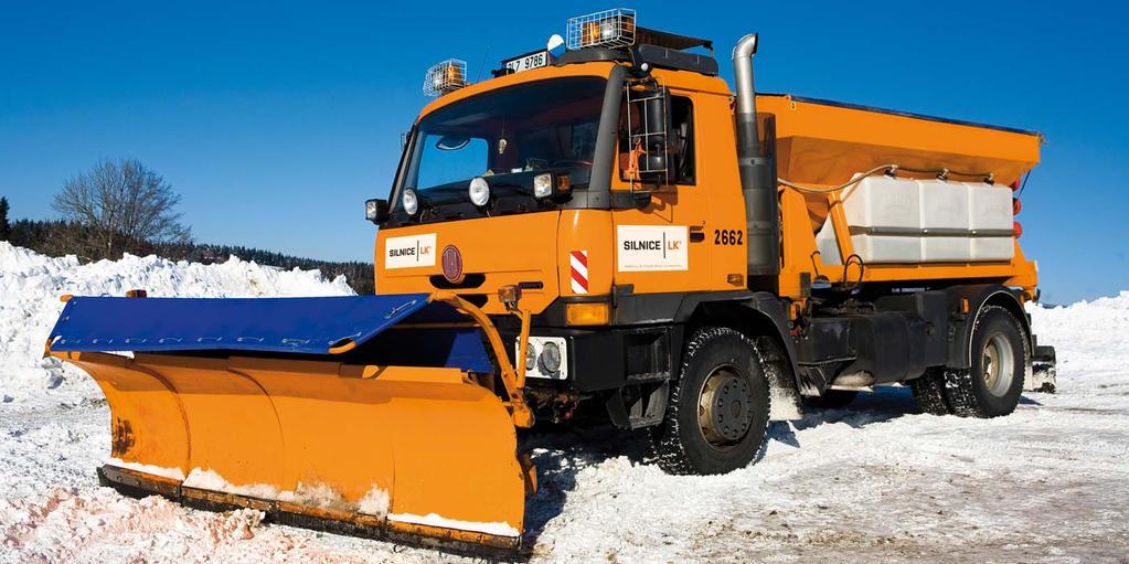 AUTOMOBILY Pracovní auta Pracovní oranžová auta jsou označena logem na bílém podkladu.